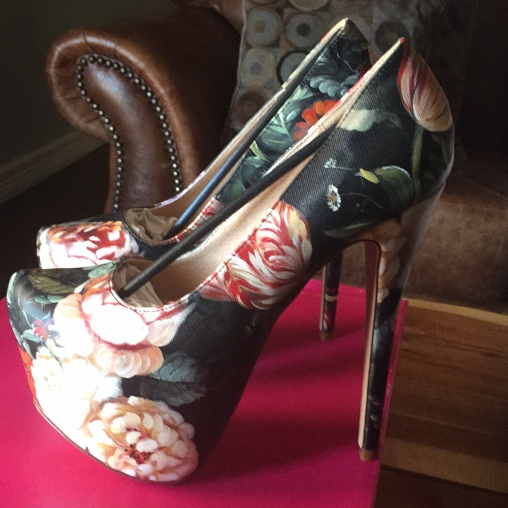 Brand new never worn heels. Still in original box.